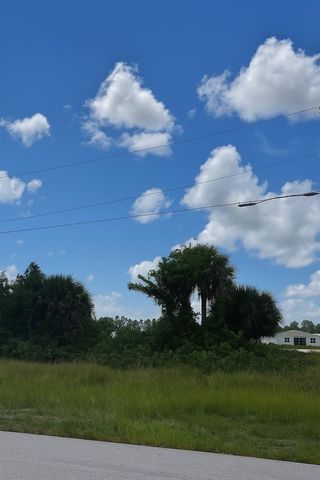 834 JAGUAR BOULEVARD, Lehigh Acres, FL 33974