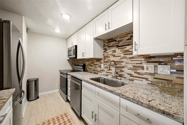 5195 VINELAND ROAD B102, Orlando, FL 32811