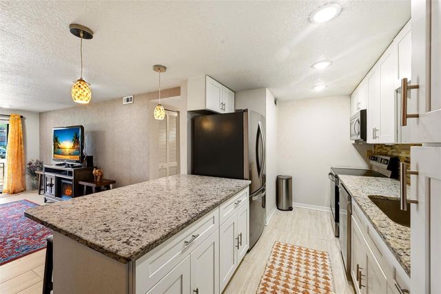 5195 VINELAND ROAD B102, Orlando, FL 32811