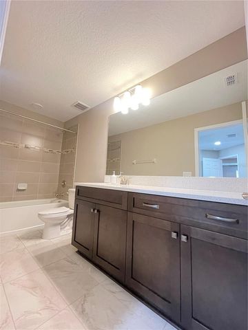 33234 SYCAMORE LEAF DRIVE, Wesley Chapel, FL 33545