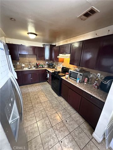 9121 Orchard, Los Angeles, CA 90044