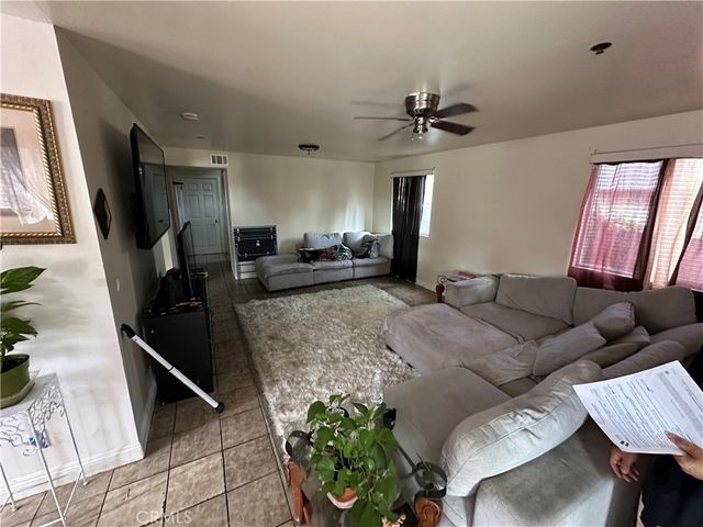 9121 Orchard, Los Angeles, CA 90044