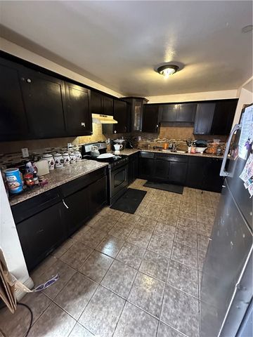 9121 Orchard, Los Angeles, CA 90044