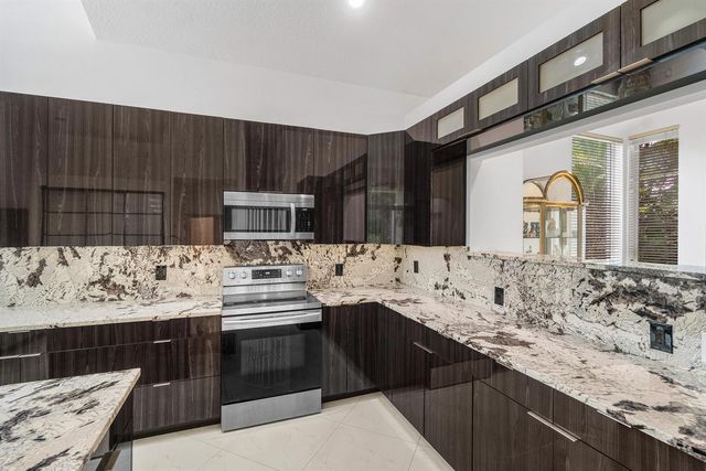 7087 NW 78th Place, Parkland, FL 33067