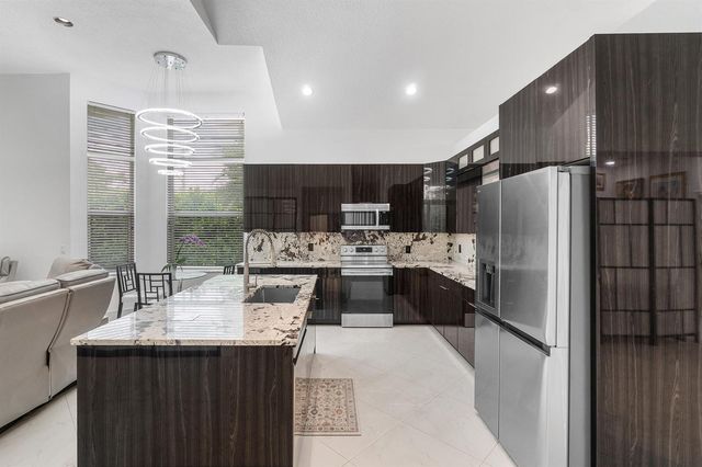 7087 NW 78th Place, Parkland, FL 33067