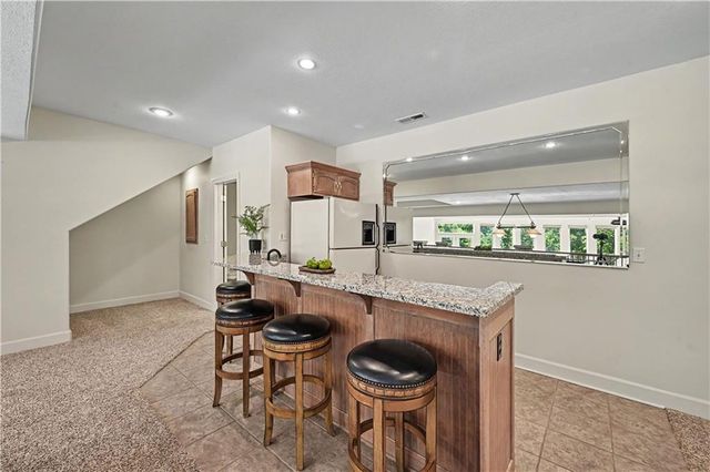 2210 SW Opossum Hollow Road, Blue Springs, MO 64015