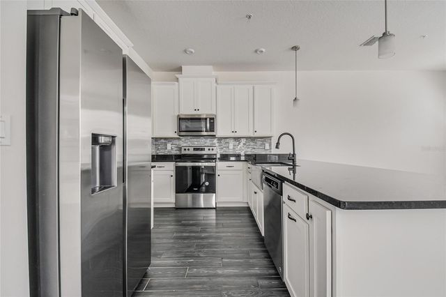 9586 POPLAR RIDGE AVENUE, Orlando, FL 32832