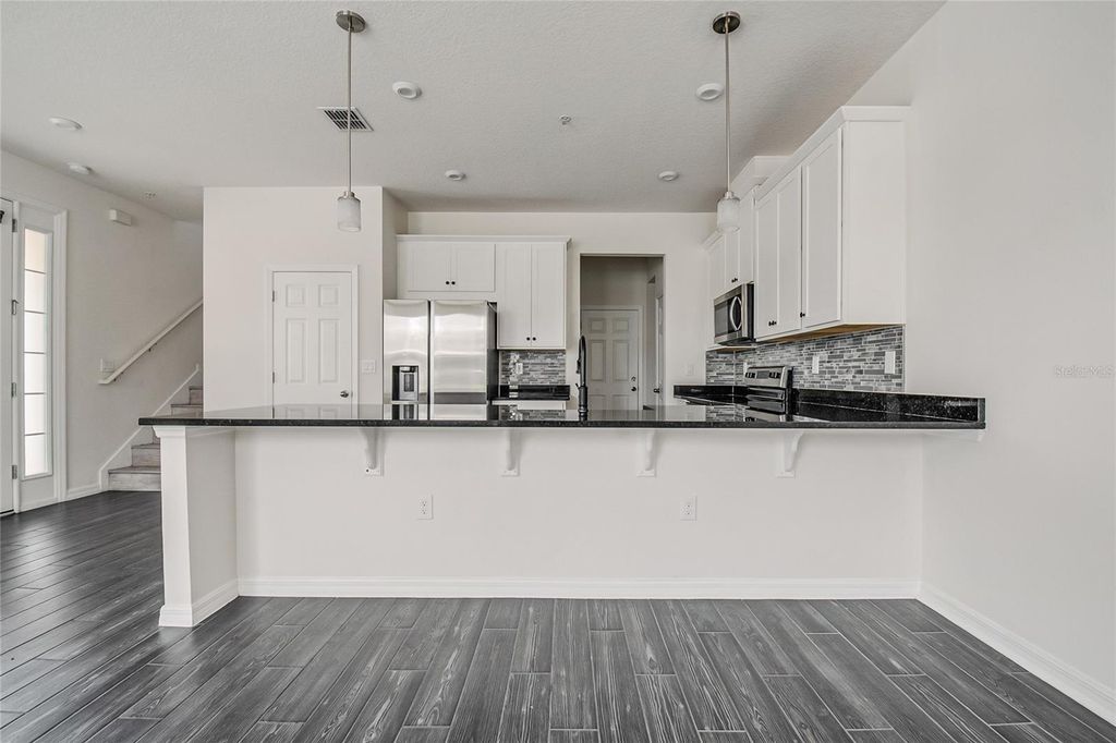 Image 13 of property listing at 9586 POPLAR RIDGE AVENUE, Orlando, FL 32832