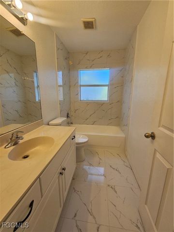 1127 Croquet ST E, Lehigh Acres, FL 33974