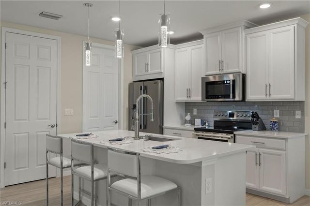 14680 Edgewater CIR, Naples, FL 34114