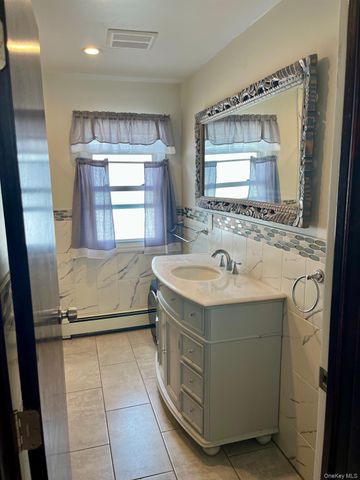 85 Spencer Avenue, Lynbrook, NY 11563