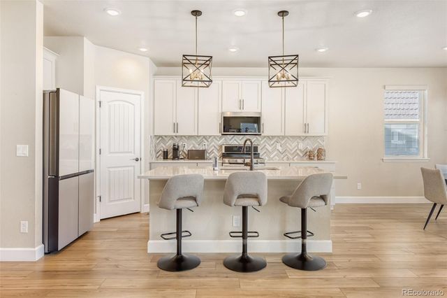 9857 Rosalee Peak Street, Littleton, CO 80125