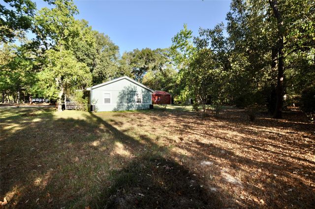 208 Blue Lake Drive, Huffman, TX 77336