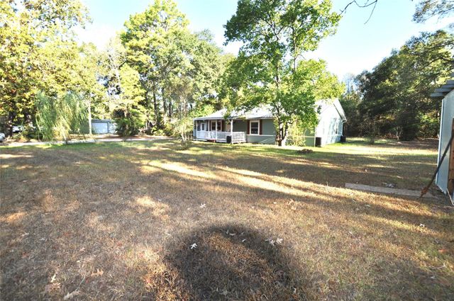 208 Blue Lake Drive, Huffman, TX 77336