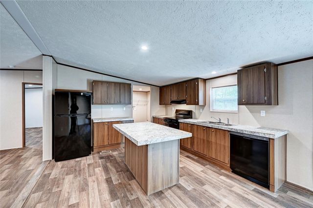 7996 Tawnyberry Lane, Plantersville, TX 77363