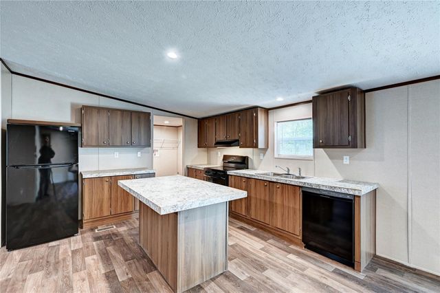 7996 Tawnyberry Lane, Plantersville, TX 77363