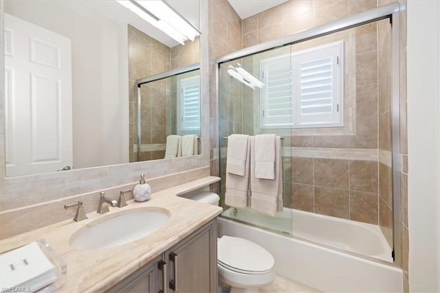 3168 Pacific DR, Naples, FL 34119