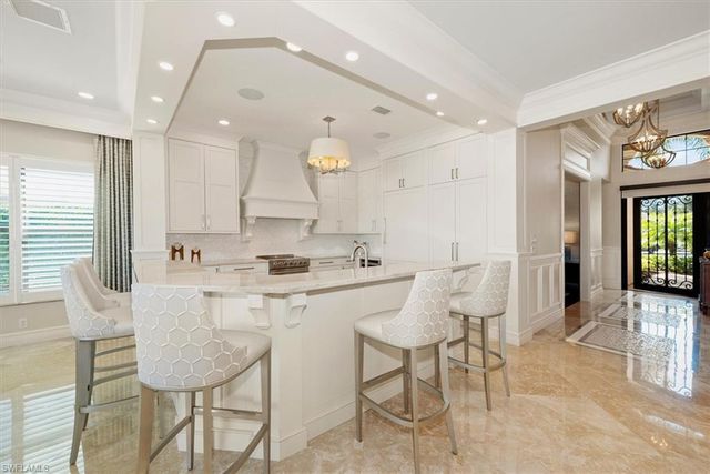 3168 Pacific DR, Naples, FL 34119