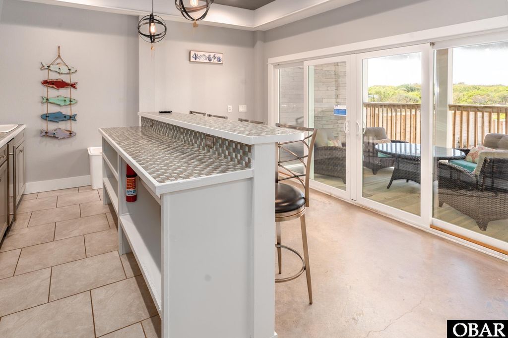 Image 22 of property listing at 1469 Ocean Pearl Road, Corolla, NC 27927