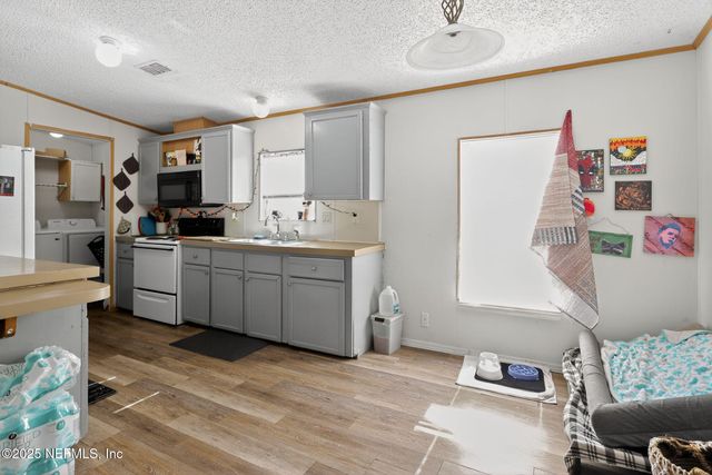 136 E MOCCASIN CREEK Lane, Palatka, FL 32177