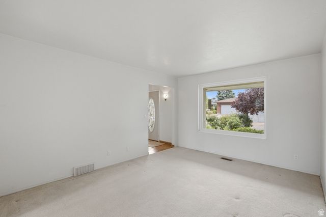 3006 W ROBINWOOD DR, Taylorsville, UT 84129