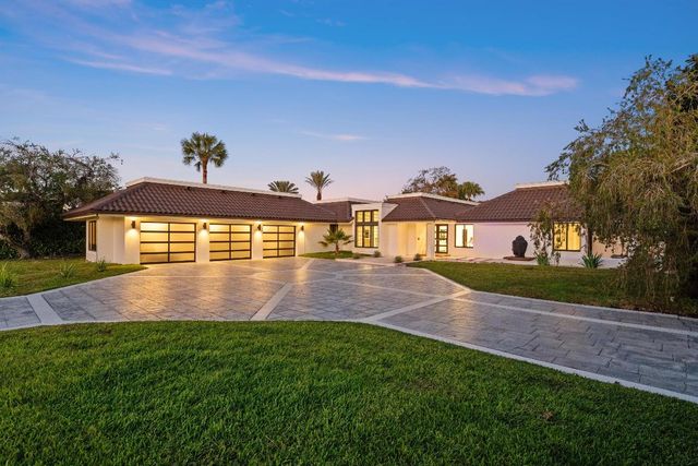 1648 Breakers West Boulevard, West Palm Beach, FL 33411