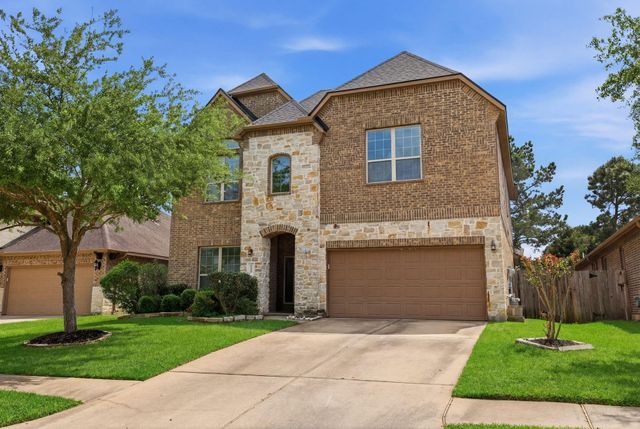 135 Deerfield Meadow Drive, Conroe, TX 77384
