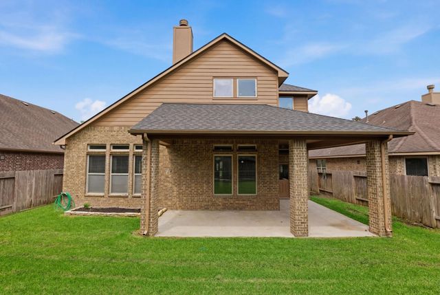 135 Deerfield Meadow Drive, Conroe, TX 77384