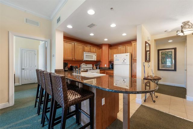 1597 HERITAGE CROSSING COURT 302, Reunion, FL 34747