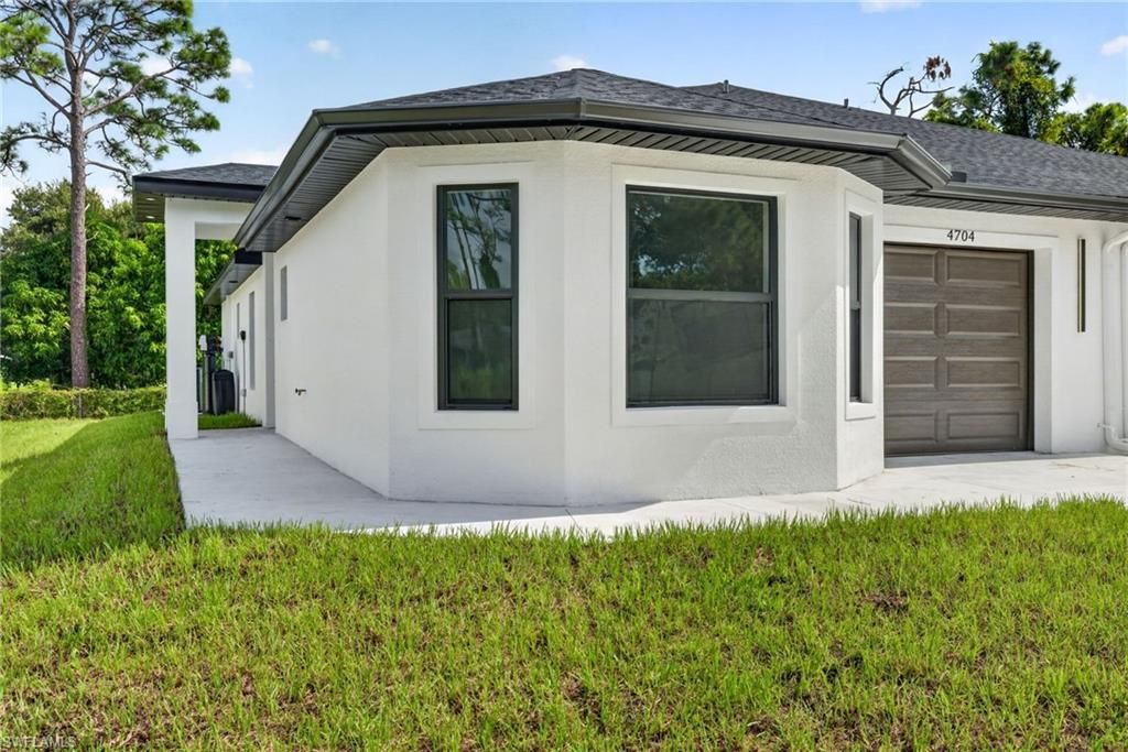 4704-4706 30th ST SW, LEHIGH ACRES, FL 33973 — photo 2