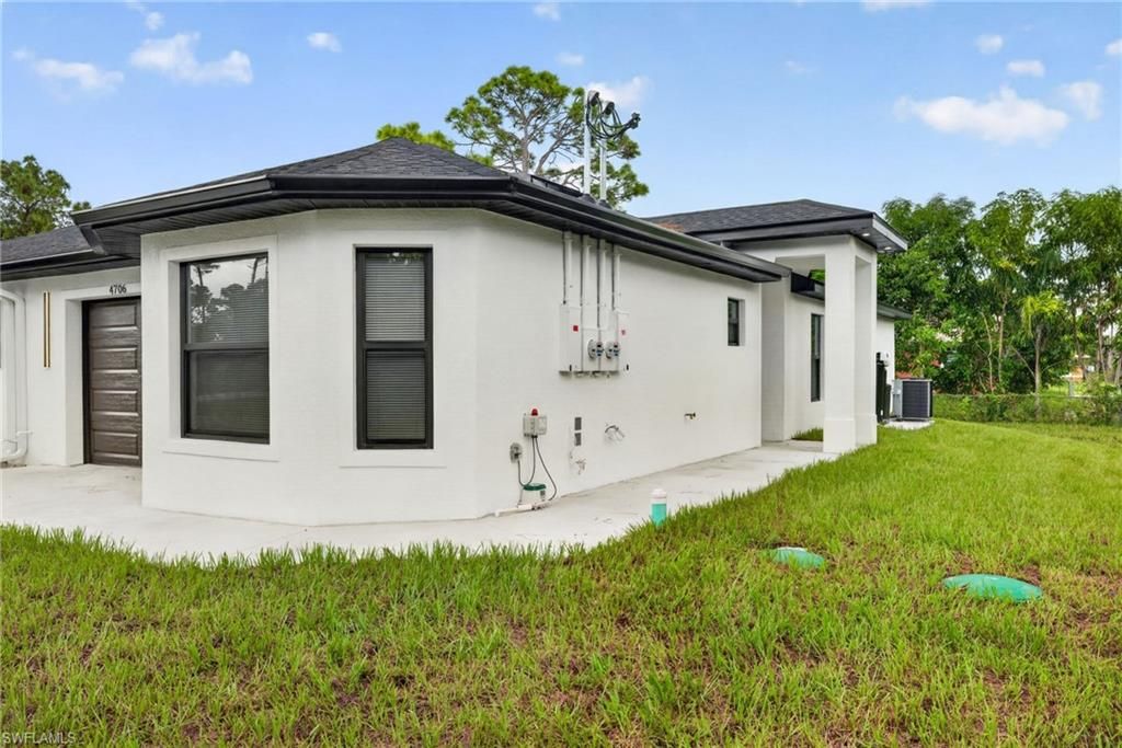 4704-4706 30th ST SW, LEHIGH ACRES, FL 33973 — photo 3