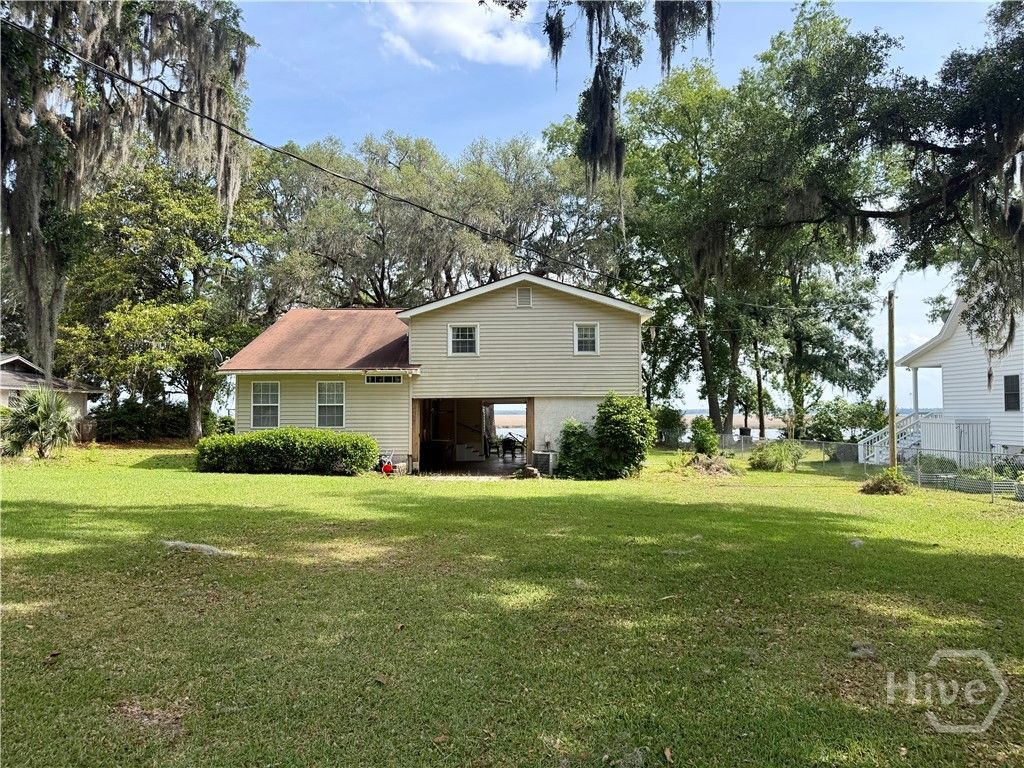 Image 1 of property listing at 246 Old Mill Road E, Richmond Hill, GA 31324