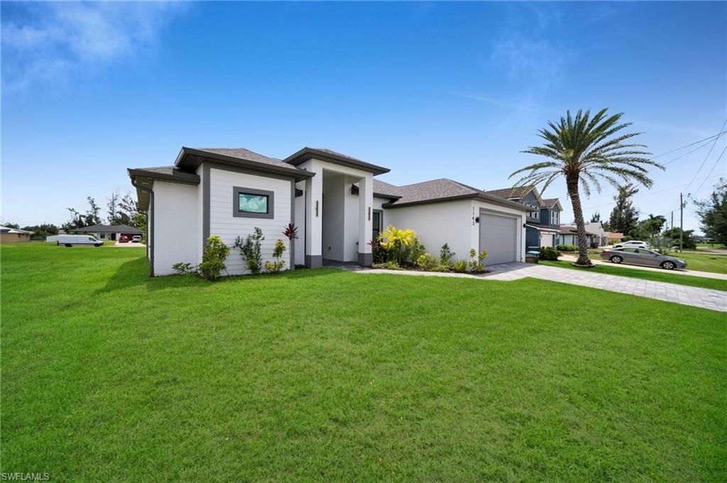 1143 NW 27th PL, CAPE CORAL, FL 33993 — photo 3