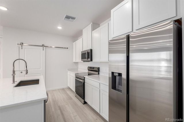 6153 N Ceylon Street 204, Denver, CO 80249