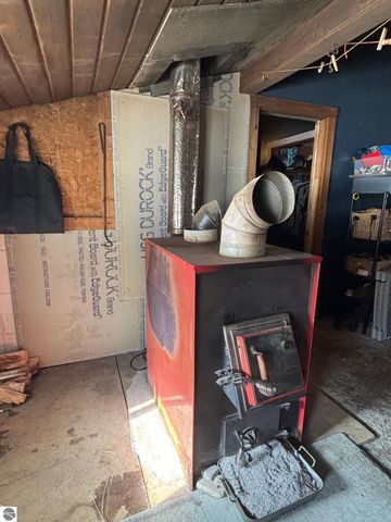 5884 Scholl Road, Mancelona, MI 49659