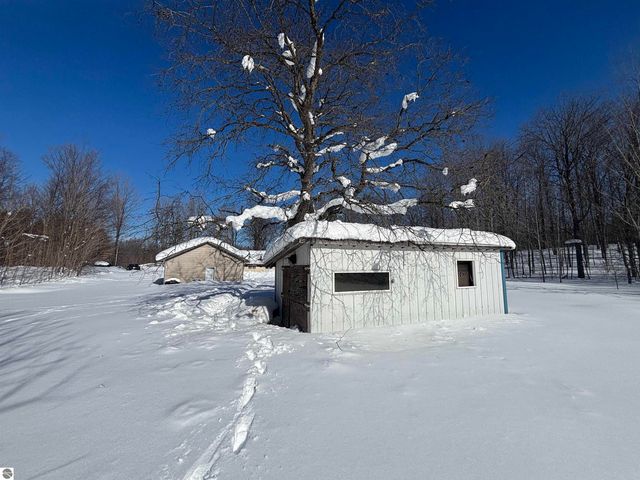 5884 Scholl Road, Mancelona, MI 49659
