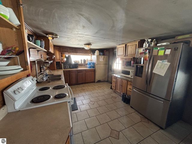 5884 Scholl Road, Mancelona, MI 49659