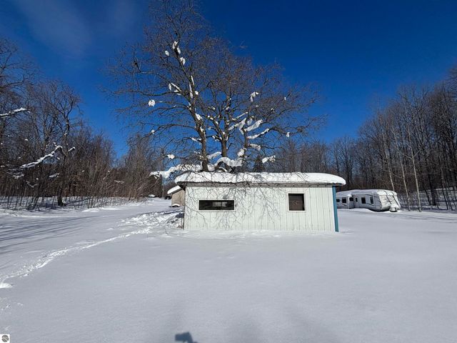 5884 Scholl Road, Mancelona, MI 49659