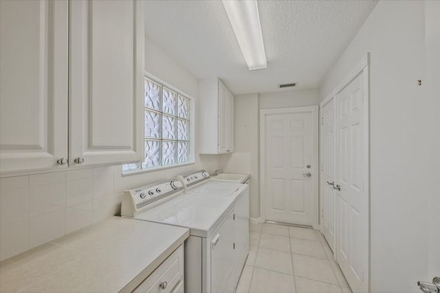 5063 Magnolia Bay Circle, Palm Beach Gardens, FL 33418