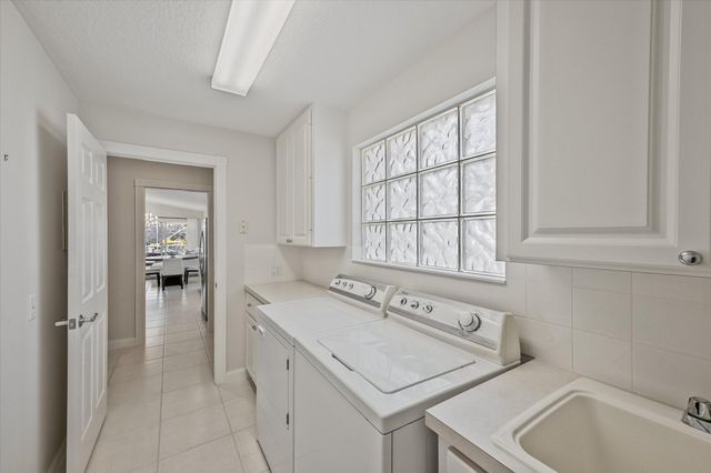 5063 Magnolia Bay Circle, Palm Beach Gardens, FL 33418