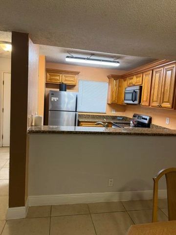 1480 WINDORAH Way B, West Palm Beach, FL 33411