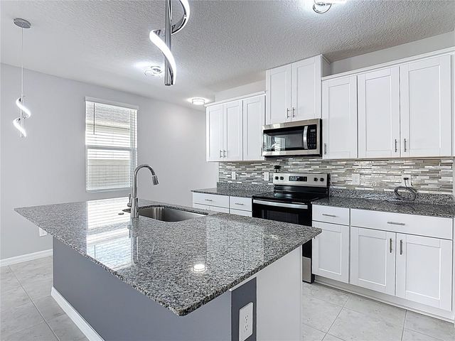5505 CLOVE ROW, Haines City, FL 33844