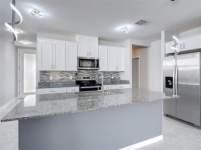 5505 CLOVE ROW, Haines City, FL 33844