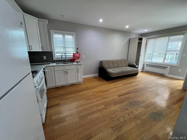 6324 Saunders Street, Rego Park, NY 11374
