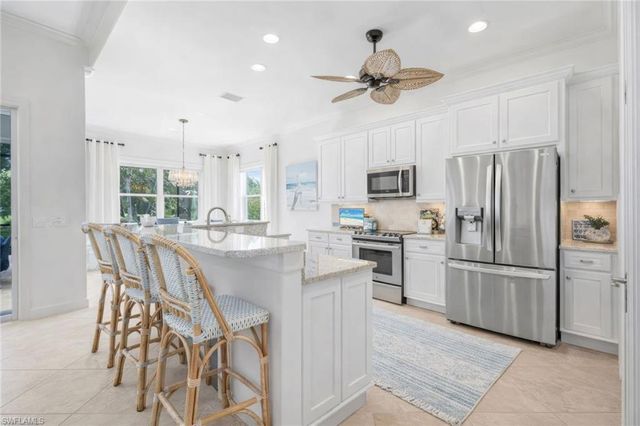 9090 Limestone LN, Naples, FL 34120