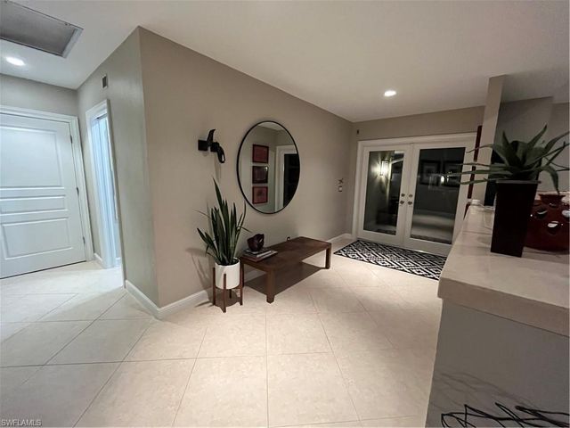240 Nottingham DR, Naples, FL 34109