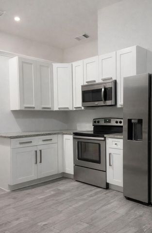 2815 SE Tate Avenue, Port St. Lucie, Port St Lucie, FL 34984