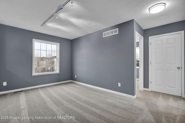 695 Phoebe Lane, East Lansing, MI 48823