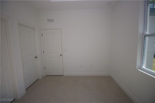 1260 MILWAUKEE BLVD 1260, Lehigh Acres, FL 33974