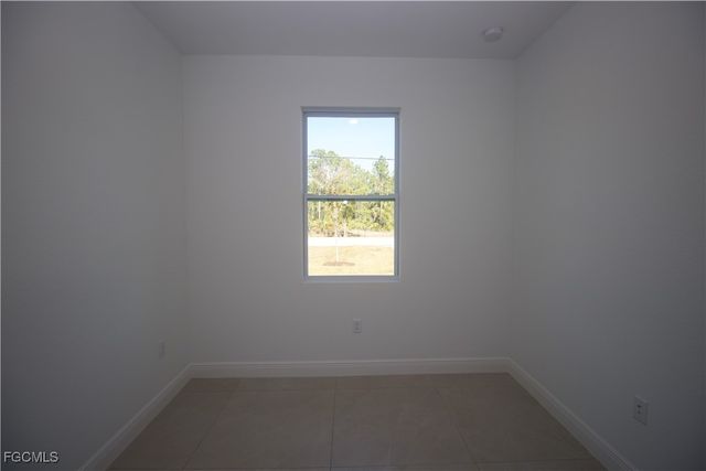 1260 MILWAUKEE BLVD 1260, Lehigh Acres, FL 33974